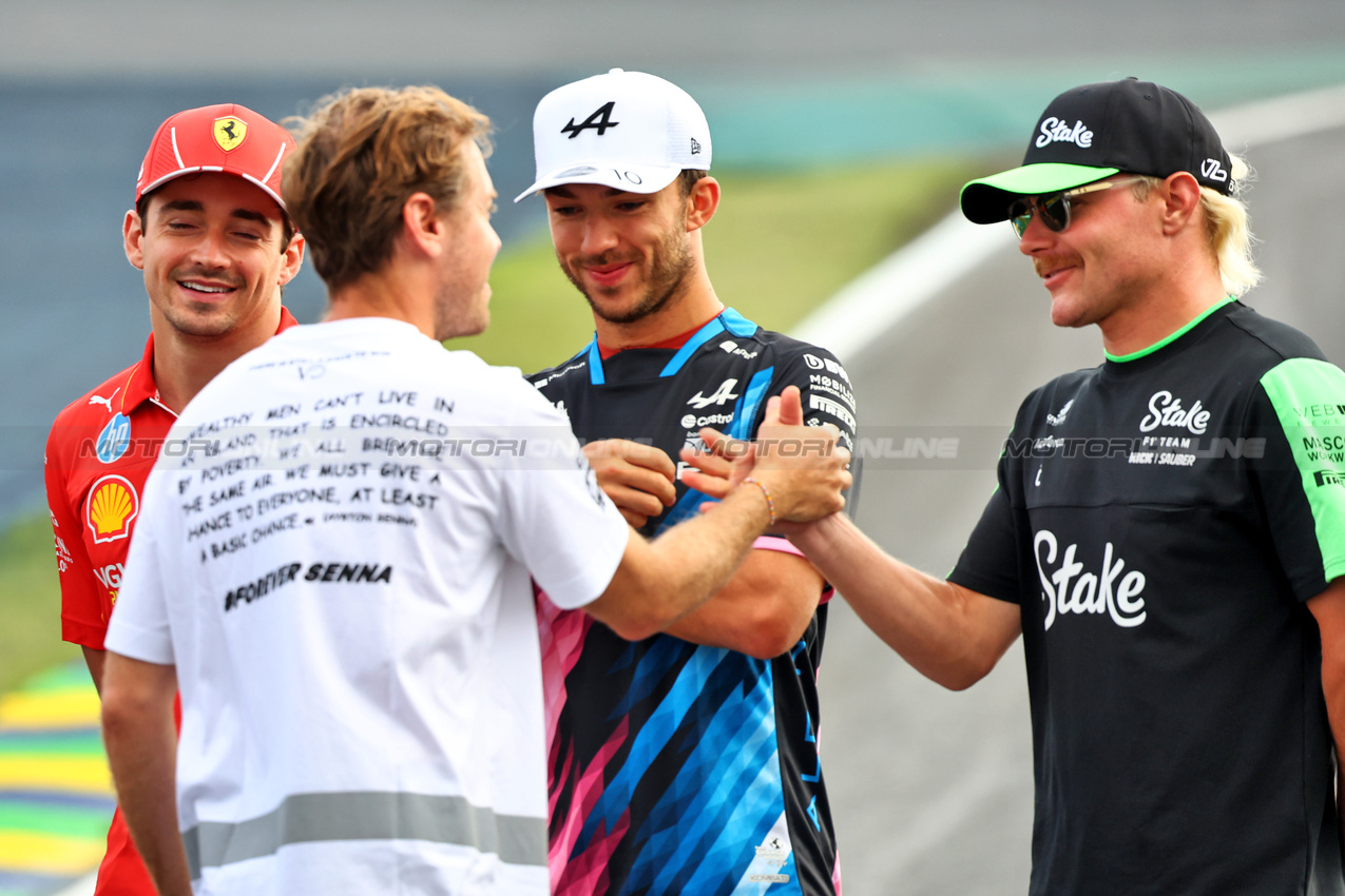 GP BRASILE, Sebastian Vettel (GER) with Pierre Gasly (FRA) Alpine F1 Team e Valtteri Bottas (FIN) Sauber.

31.10.2024. Formula 1 World Championship, Rd 21, Brazilian Grand Prix, Sao Paulo, Brazil, Preparation Day.

- www.xpbimages.com, EMail: requests@xpbimages.com © Copyright: Batchelor / XPB Images