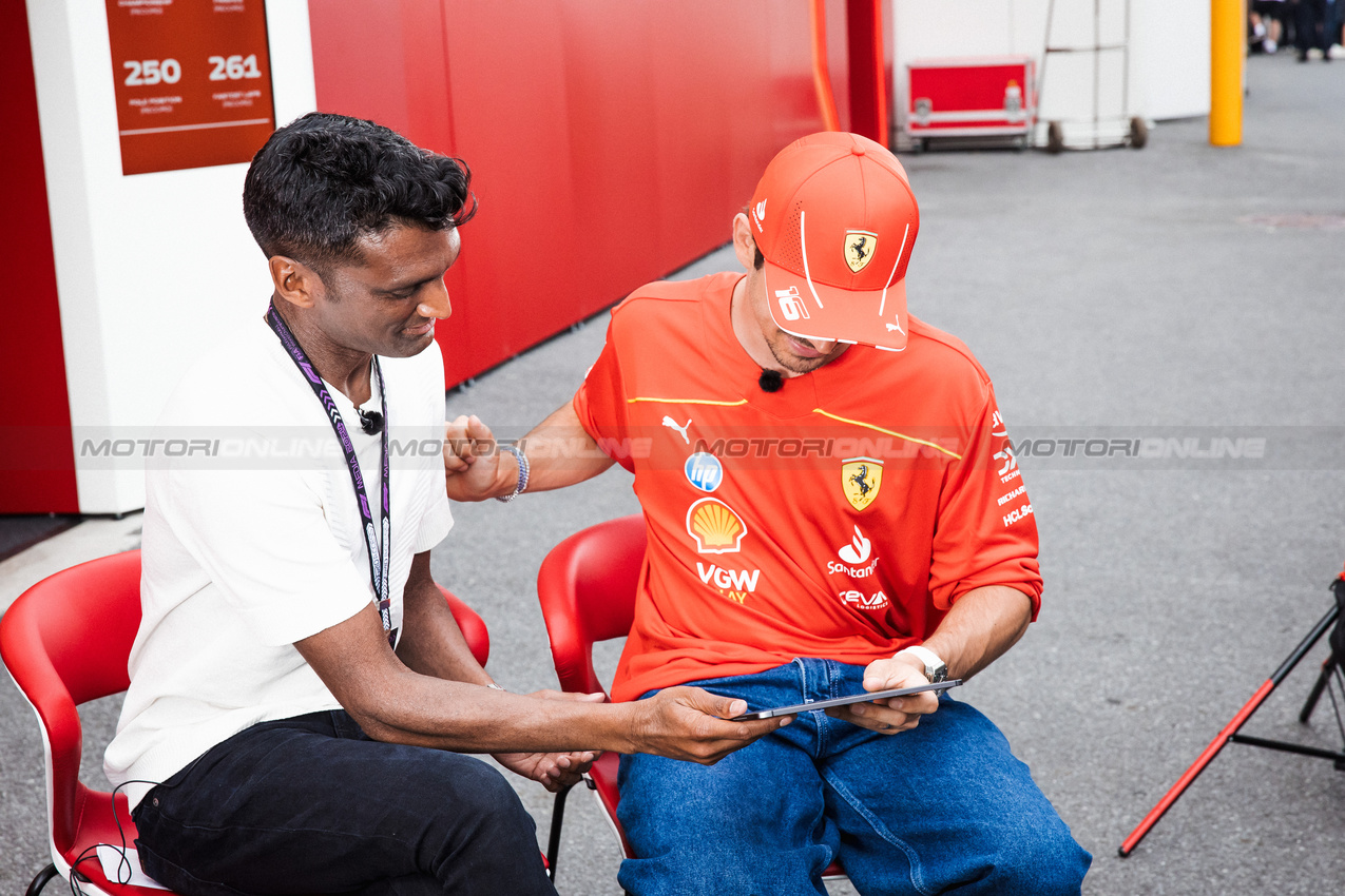 GP CANADA, Charles Leclerc (MON) Ferrari with Lawrence Barretto (GBR) Formula 1 Senior Writer Editor.

06.06.2024. Formula 1 World Championship, Rd 9, Canadian Grand Prix, Montreal, Canada, Preparation Day.

- www.xpbimages.com, EMail: requests@xpbimages.com © Copyright: Bearne / XPB Images