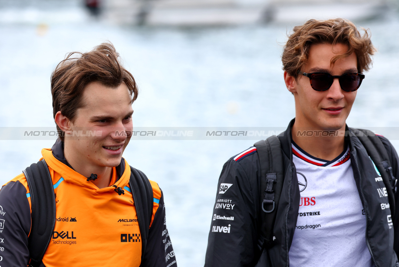 GP CANADA, (L to R): Oscar Piastri (AUS) McLaren with George Russell (GBR) Mercedes AMG F1.

08.06.2024. Formula 1 World Championship, Rd 9, Canadian Grand Prix, Montreal, Canada, Qualifiche Day.

 - www.xpbimages.com, EMail: requests@xpbimages.com © Copyright: Coates / XPB Images