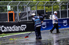 GP CANADA, Circuit Atmosfera - a marshal sweeps the circuit of debris following a thunderstorm.

07.06.2024. Formula 1 World Championship, Rd 9, Canadian Grand Prix, Montreal, Canada, Practice Day.

 - www.xpbimages.com, EMail: requests@xpbimages.com © Copyright: Coates / XPB Images