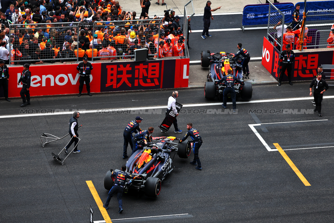 GP CINA, Red Bull Racing RB20s pushed into parc ferme at the end of the race.

21.04.2024. Formula 1 World Championship, Rd 5, Chinese Grand Prix, Shanghai, China, Gara Day.

 - www.xpbimages.com, EMail: requests@xpbimages.com © Copyright: Coates / XPB Images