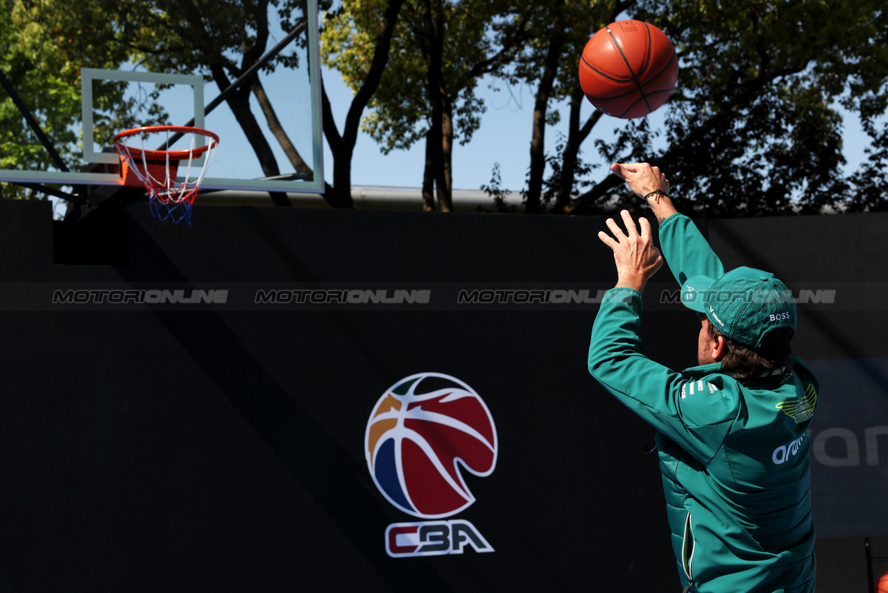 GP CINA, Fernando Alonso (ESP) Aston Martin F1 Team plays basketball in the paddock.

18.04.2024. Formula 1 World Championship, Rd 5, Chinese Grand Prix, Shanghai, China, Preparation Day.

- www.xpbimages.com, EMail: requests@xpbimages.com © Copyright: Rew / XPB Images