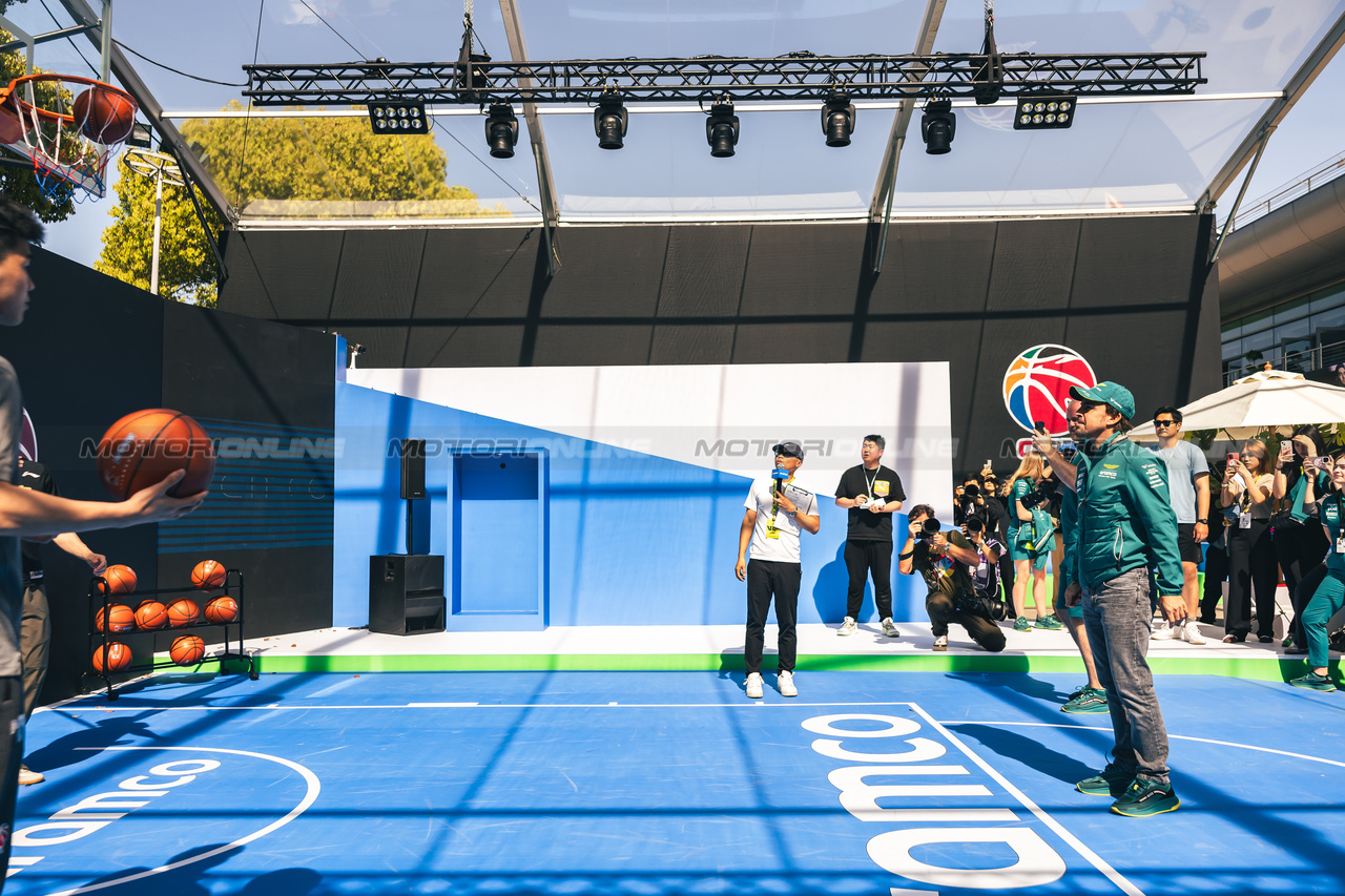 GP CINA, Fernando Alonso (ESP) Aston Martin F1 Team plays basketball in the paddock.

18.04.2024. Formula 1 World Championship, Rd 5, Chinese Grand Prix, Shanghai, China, Preparation Day.

- www.xpbimages.com, EMail: requests@xpbimages.com © Copyright: Bearne / XPB Images