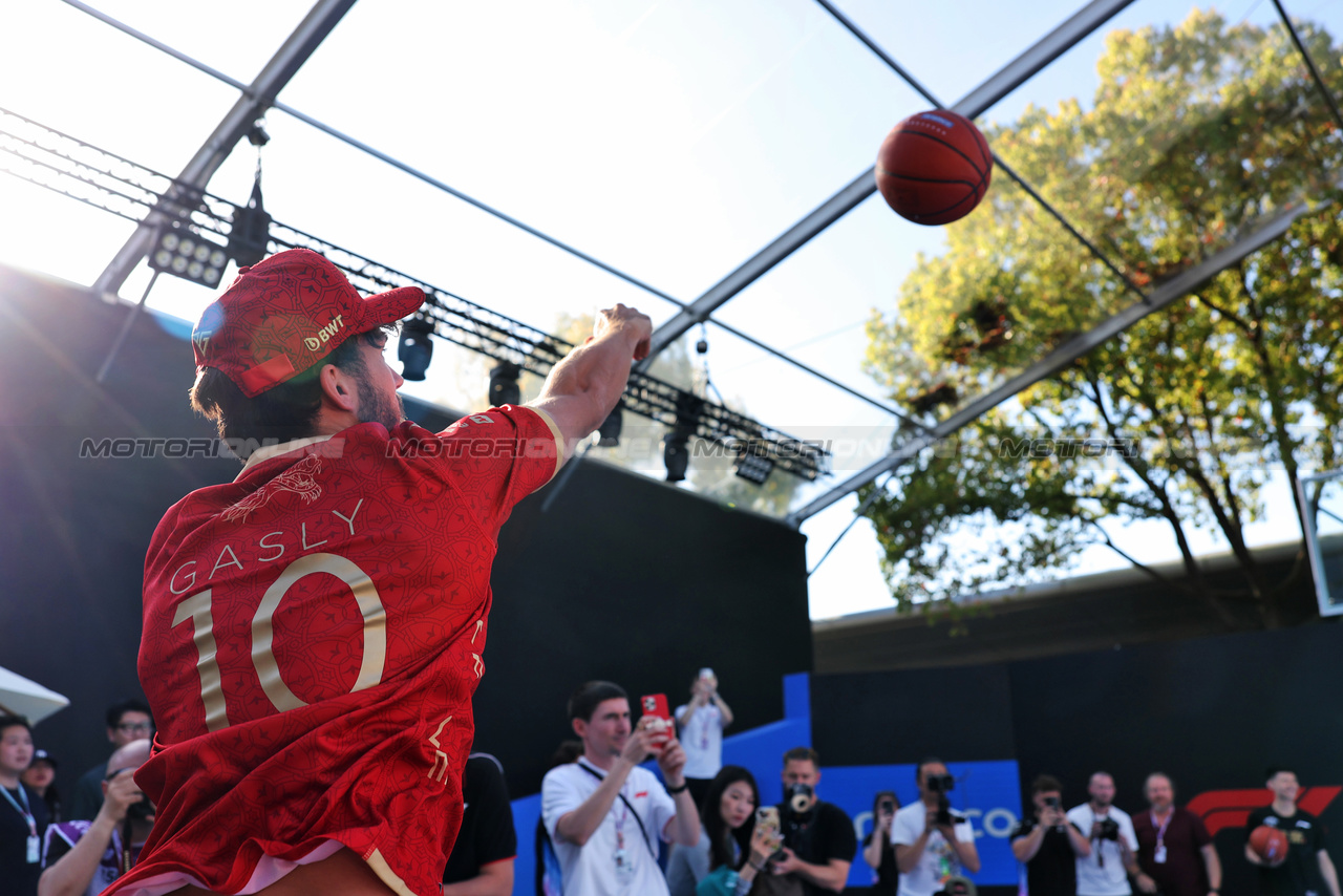 GP CINA, Pierre Gasly (FRA) Alpine F1 Team plays basketball in the paddock.

18.04.2024. Formula 1 World Championship, Rd 5, Chinese Grand Prix, Shanghai, China, Preparation Day.

- www.xpbimages.com, EMail: requests@xpbimages.com © Copyright: Rew / XPB Images