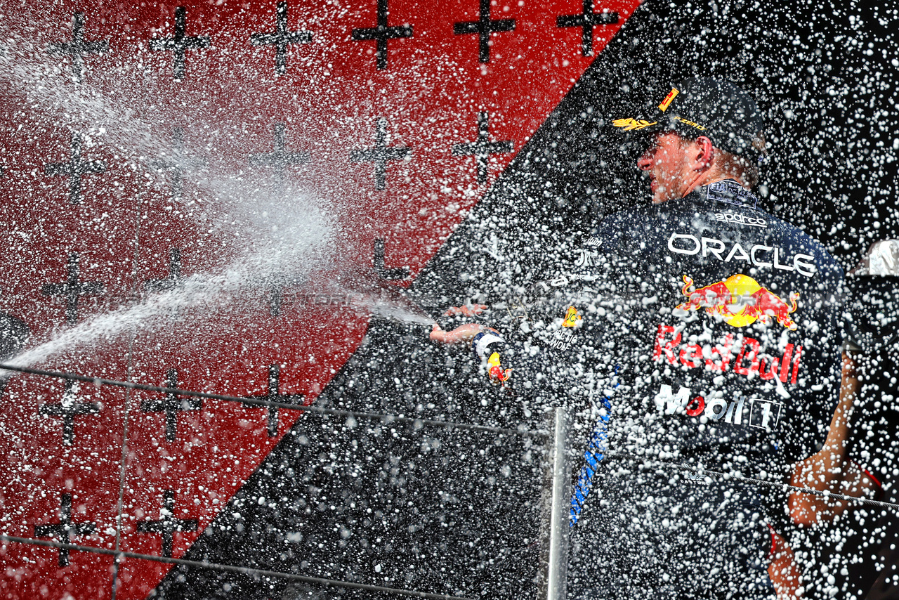 GP IMOLA, Gara winner Max Verstappen (NLD) Red Bull Racing celebrates on the podium.

19.05.2024. Formula 1 World Championship, Rd 7, Emilia Romagna Grand Prix, Imola, Italy, Gara Day.

 - www.xpbimages.com, EMail: requests@xpbimages.com © Copyright: Coates / XPB Images