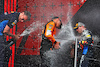 GP IMOLA, (L to R): David Morgan (GBR) Red Bull Racing Aero Trackside Performance Team Leader; Lando Norris (GBR) McLaren; e vincitore Max Verstappen (NLD) Red Bull Racing, celebrate on the podium.
19.05.2024. Formula 1 World Championship, Rd 7, Emilia Romagna Grand Prix, Imola, Italy, Gara Day.
 - www.xpbimages.com, EMail: requests@xpbimages.com © Copyright: Coates / XPB Images