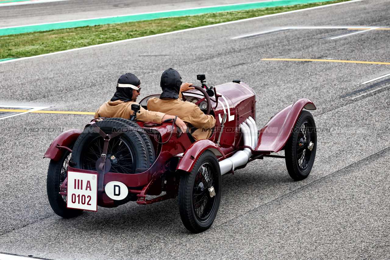 GP IMOLA, George Russell (GBR) Mercedes AMG F1 e Timo Glock (GER) in vintage race overalls in a 1924 Targa Florio Mercedes racing car.

16.05.2024. Formula 1 World Championship, Rd 7, Emilia Romagna Grand Prix, Imola, Italy, Preparation Day.

- www.xpbimages.com, EMail: requests@xpbimages.com © Copyright: Batchelor / XPB Images