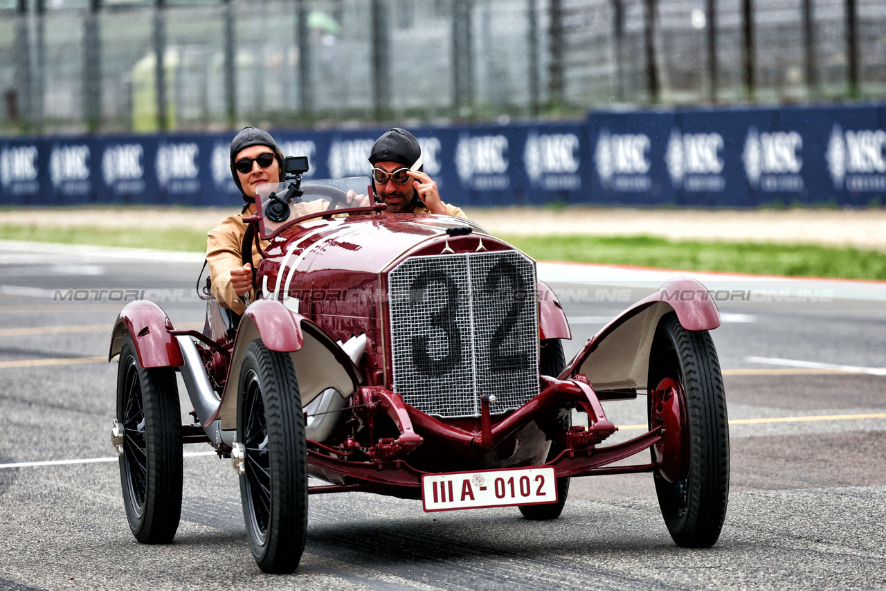 GP IMOLA, George Russell (GBR) Mercedes AMG F1 e Timo Glock (GER) in vintage race overalls in a 1924 Targa Florio Mercedes racing car.

16.05.2024. Formula 1 World Championship, Rd 7, Emilia Romagna Grand Prix, Imola, Italy, Preparation Day.

- www.xpbimages.com, EMail: requests@xpbimages.com © Copyright: Batchelor / XPB Images