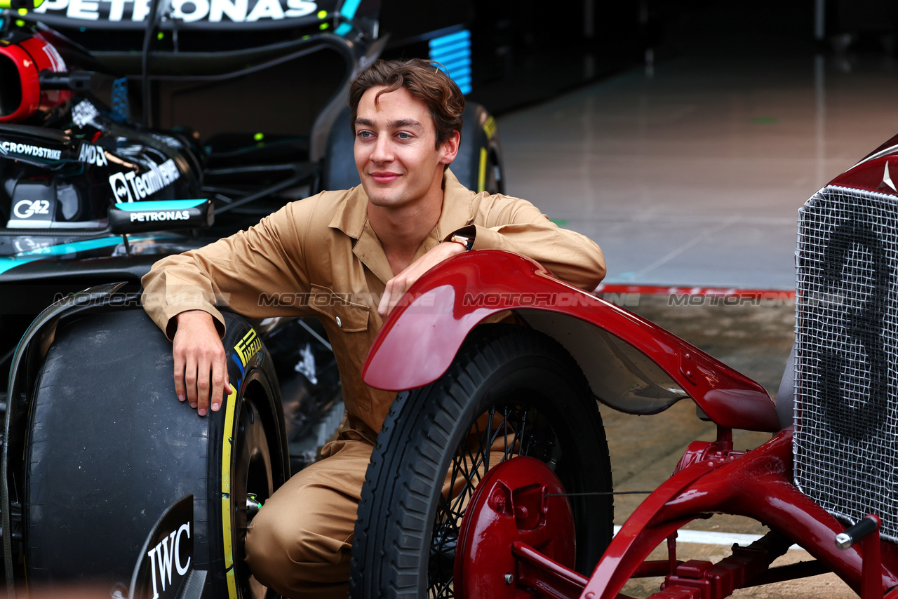 GP IMOLA, George Russell (GBR) in vintage race overalls with the Mercedes AMG F1 W15 e a 1924 Targa Florio Mercedes racing car.

16.05.2024. Formula 1 World Championship, Rd 7, Emilia Romagna Grand Prix, Imola, Italy, Preparation Day.

 - www.xpbimages.com, EMail: requests@xpbimages.com © Copyright: Coates / XPB Images