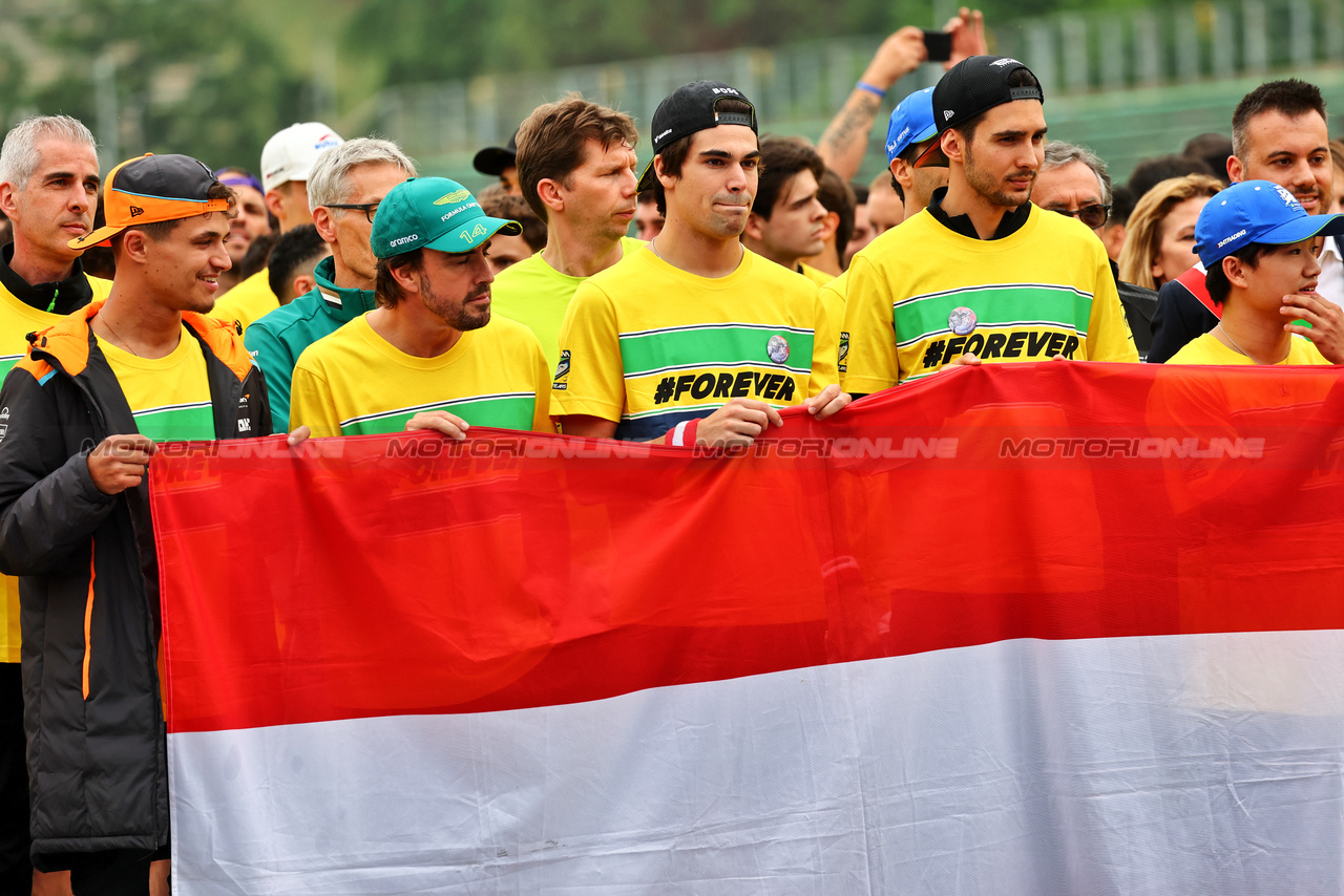 GP IMOLA, (L to R): Lando Norris (GBR) McLaren; Fernando Alonso (ESP) Aston Martin F1 Team; Lance Stroll (CDN) Aston Martin F1 Team; Esteban Ocon (FRA) Alpine F1 Team; e Yuki Tsunoda (JPN) RB - tribute run for Ayrton Senna e Roland Ratzenberger.

16.05.2024. Formula 1 World Championship, Rd 7, Emilia Romagna Grand Prix, Imola, Italy, Preparation Day.

- www.xpbimages.com, EMail: requests@xpbimages.com © Copyright: Batchelor / XPB Images