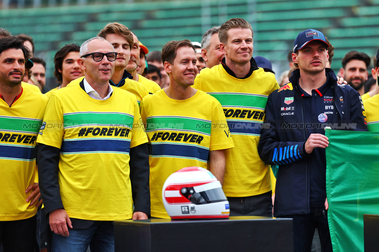 GP IMOLA, (L to R): Carlos Sainz Jr (ESP) Ferrari; Stefano Domenicali (ITA) Formula One President e CEO; Lance Stroll (CDN) Aston Martin F1 Team; Nico Hulkenberg (GER) Haas F1 Team; Max Verstappen (NLD) Red Bull Racing - tribute run for Ayrton Senna e Roland Ratzenberger.

16.05.2024. Formula 1 World Championship, Rd 7, Emilia Romagna Grand Prix, Imola, Italy, Preparation Day.

- www.xpbimages.com, EMail: requests@xpbimages.com © Copyright: Batchelor / XPB Images