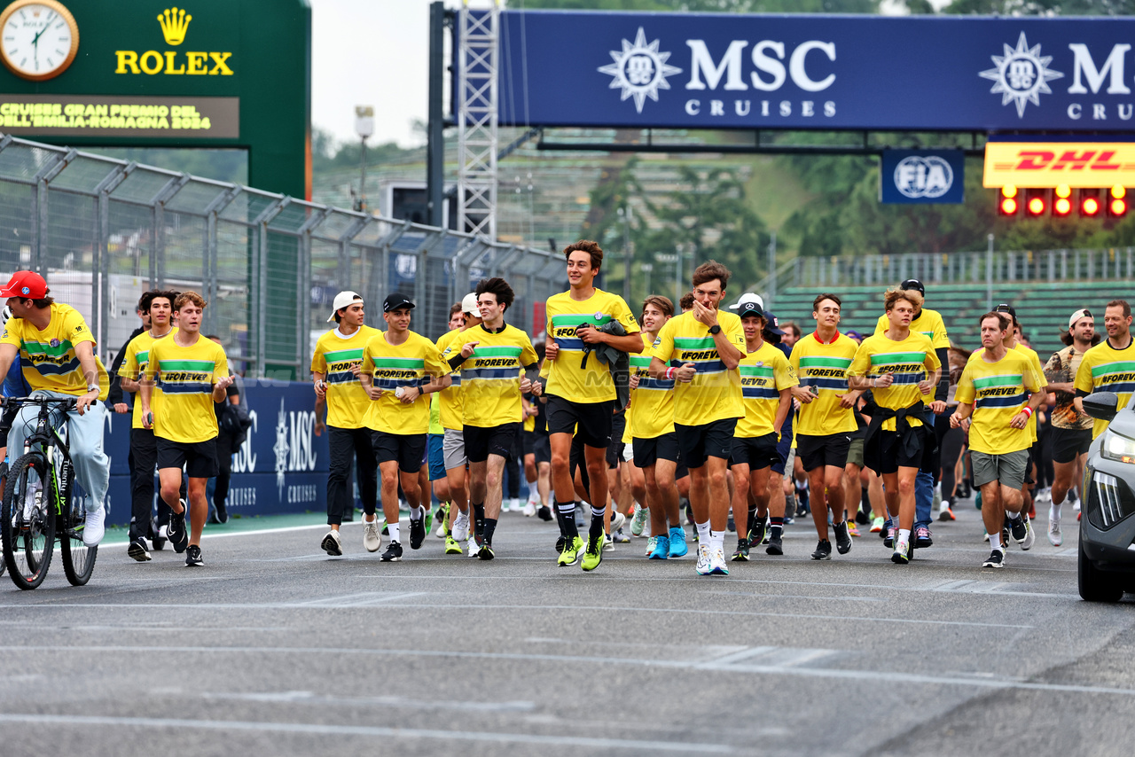 GP IMOLA, George Russell (GBR) Mercedes AMG F1 e Pierre Gasly (FRA) Alpine F1 Team - lead a tribute run for Ayrton Senna e Roland Ratzenberger.

16.05.2024. Formula 1 World Championship, Rd 7, Emilia Romagna Grand Prix, Imola, Italy, Preparation Day.

- www.xpbimages.com, EMail: requests@xpbimages.com © Copyright: Batchelor / XPB Images