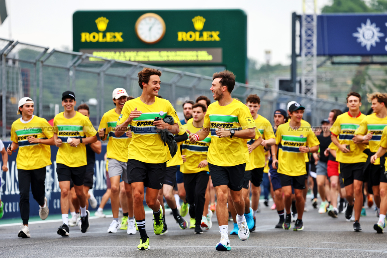 GP IMOLA, George Russell (GBR) Mercedes AMG F1 e Pierre Gasly (FRA) Alpine F1 Team - lead a tribute run for Ayrton Senna e Roland Ratzenberger.

16.05.2024. Formula 1 World Championship, Rd 7, Emilia Romagna Grand Prix, Imola, Italy, Preparation Day.

- www.xpbimages.com, EMail: requests@xpbimages.com © Copyright: Batchelor / XPB Images