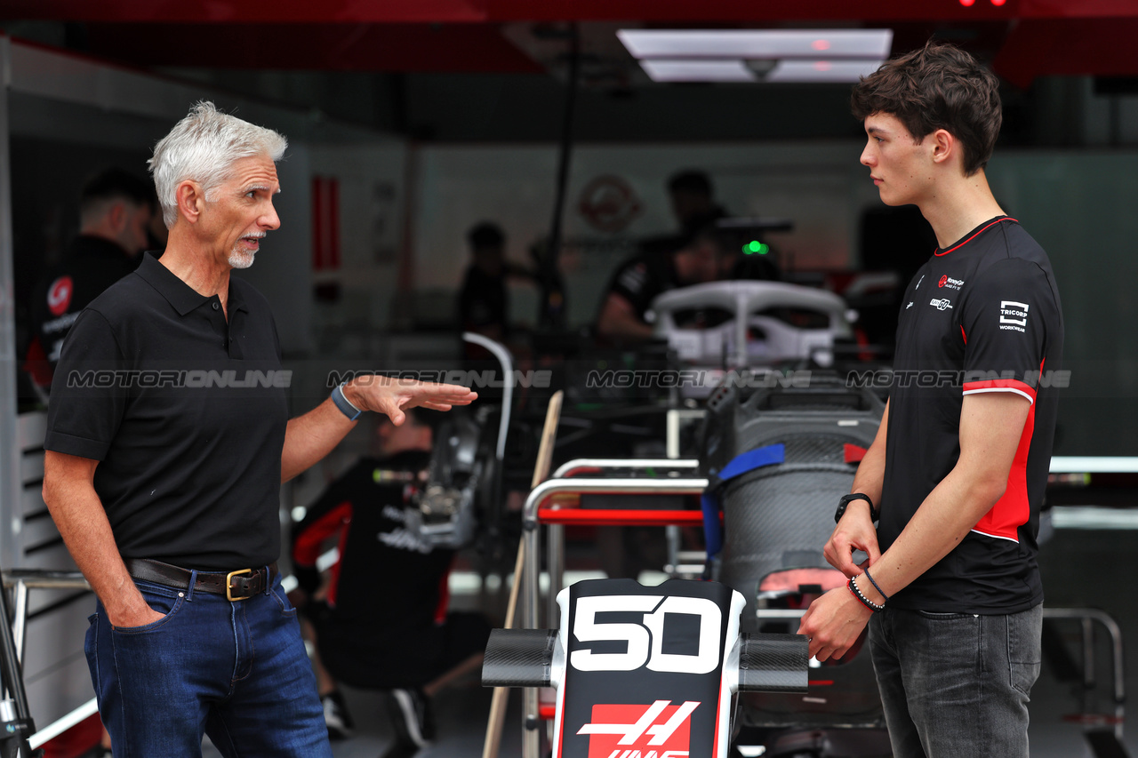 GP IMOLA, Oliver Bearman (GBR) Ferrari Reserve Driver (Right) with Damon Hill (GBR) Sky Sports Presenter.

16.05.2024. Formula 1 World Championship, Rd 7, Emilia Romagna Grand Prix, Imola, Italy, Preparation Day.

 - www.xpbimages.com, EMail: requests@xpbimages.com © Copyright: Staley / XPB Images