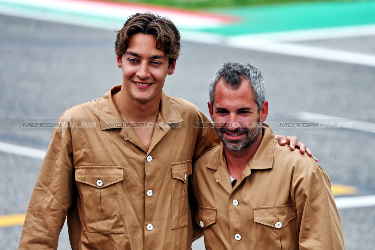 GP IMOLA, (L to R): George Russell (GBR) Mercedes AMG F1 e Timo Glock (GER) in vintage race overalls.

16.05.2024. Formula 1 World Championship, Rd 7, Emilia Romagna Grand Prix, Imola, Italy, Preparation Day.

- www.xpbimages.com, EMail: requests@xpbimages.com © Copyright: Batchelor / XPB Images