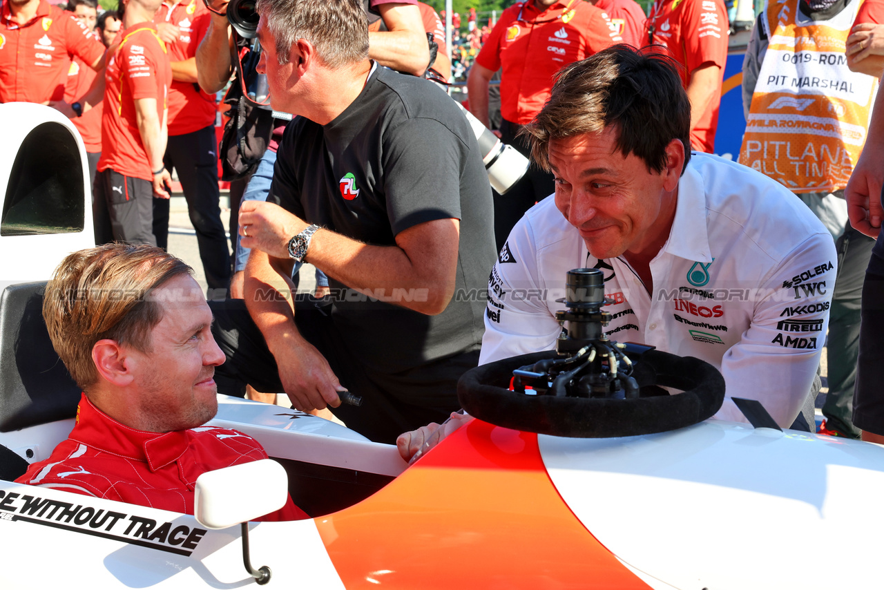 GP IMOLA, Sebastian Vettel (GER), in a 1993 McLaren MP4/8, with Toto Wolff (GER) Mercedes AMG F1 Shareholder e Executive Director.

18.05.2024. Formula 1 World Championship, Rd 7, Emilia Romagna Grand Prix, Imola, Italy, Qualifiche Day.

- www.xpbimages.com, EMail: requests@xpbimages.com © Copyright: Batchelor / XPB Images