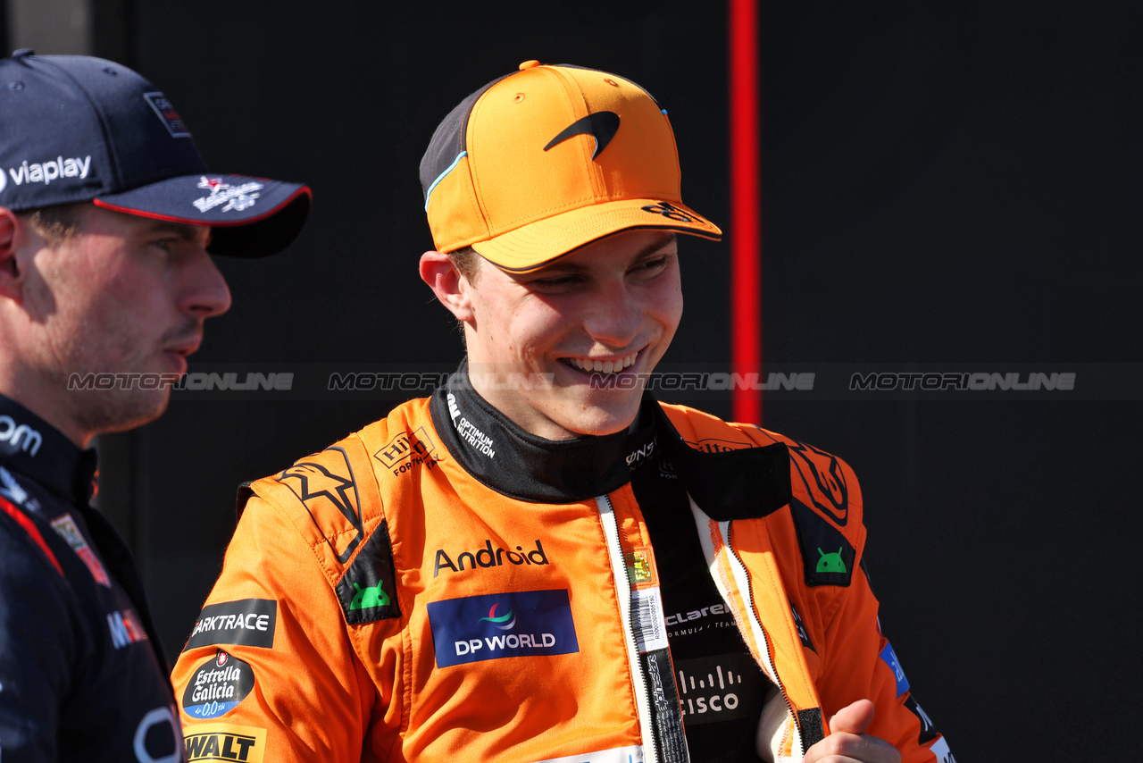 GP IMOLA, Oscar Piastri (AUS) McLaren with pole sitter Max Verstappen (NLD) Red Bull Racing in qualifying parc ferme.

18.05.2024. Formula 1 World Championship, Rd 7, Emilia Romagna Grand Prix, Imola, Italy, Qualifiche Day.

 - www.xpbimages.com, EMail: requests@xpbimages.com © Copyright: Staley / XPB Images