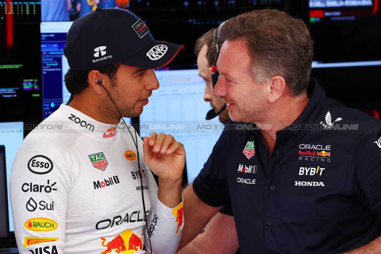 GP IMOLA, (L to R): Sergio Perez (MEX) Red Bull Racing with Christian Horner (GBR) Red Bull Racing Team Principal.

18.05.2024. Formula 1 World Championship, Rd 7, Emilia Romagna Grand Prix, Imola, Italy, Qualifiche Day.

 - www.xpbimages.com, EMail: requests@xpbimages.com © Copyright: Coates / XPB Images