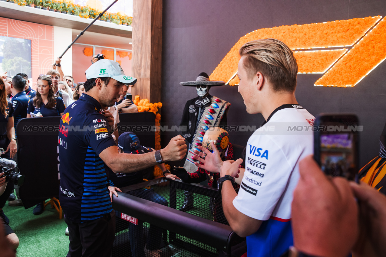 GP MESSICO, (L to R): Sergio Perez (MEX) Red Bull Racing with Liam Lawson (NZL) RB.

24.10.2024. Formula 1 World Championship, Rd 20, Mexican Grand Prix, Mexico City, Mexico, Preparation Day.

- www.xpbimages.com, EMail: requests@xpbimages.com © Copyright: Bearne / XPB Images