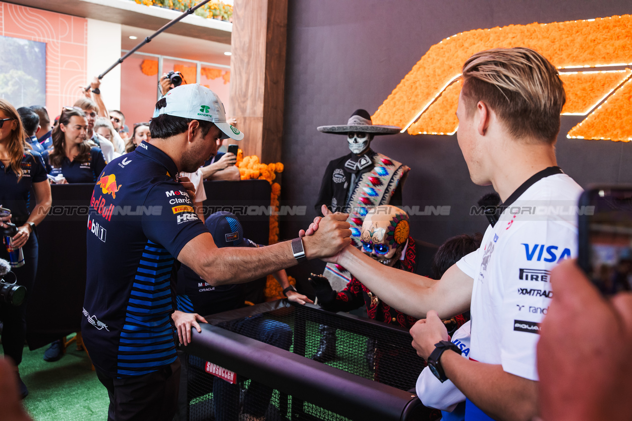 GP MESSICO, (L to R): Sergio Perez (MEX) Red Bull Racing with Liam Lawson (NZL) RB.

24.10.2024. Formula 1 World Championship, Rd 20, Mexican Grand Prix, Mexico City, Mexico, Preparation Day.

- www.xpbimages.com, EMail: requests@xpbimages.com © Copyright: Bearne / XPB Images