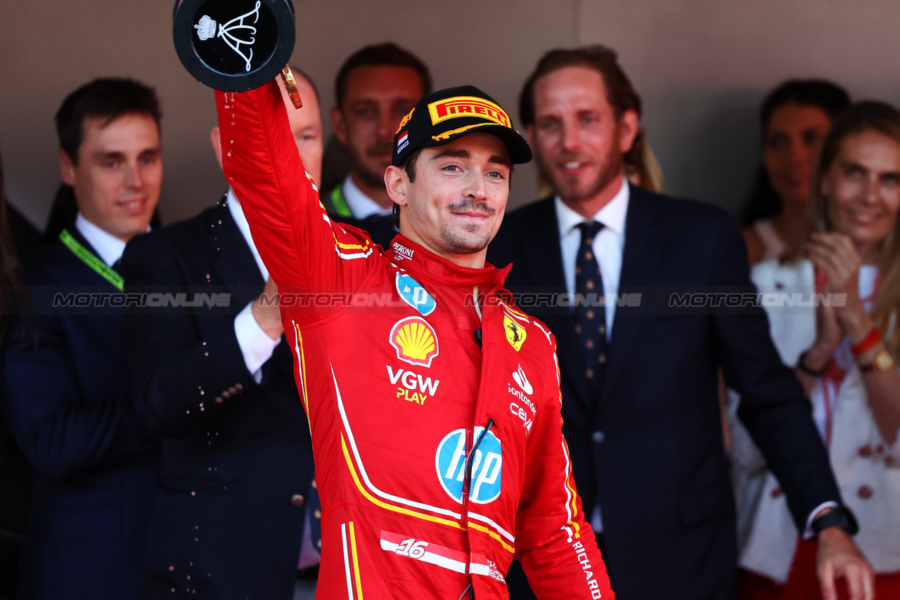 GP MONACO, Gara winner Charles Leclerc (MON) Ferrari celebrates on the podium.

26.05.2024. Formula 1 World Championship, Rd 8, Monaco Grand Prix, Monte Carlo, Monaco, Gara Day.

- www.xpbimages.com, EMail: requests@xpbimages.com © Copyright: Batchelor / XPB Images