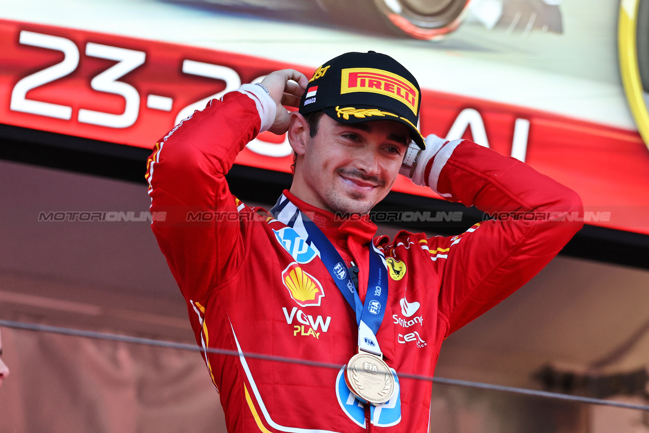 GP MONACO, Gara winner Charles Leclerc (MON) Ferrari celebrates on the podium.

26.05.2024. Formula 1 World Championship, Rd 8, Monaco Grand Prix, Monte Carlo, Monaco, Gara Day.

- www.xpbimages.com, EMail: requests@xpbimages.com © Copyright: Moy / XPB Images