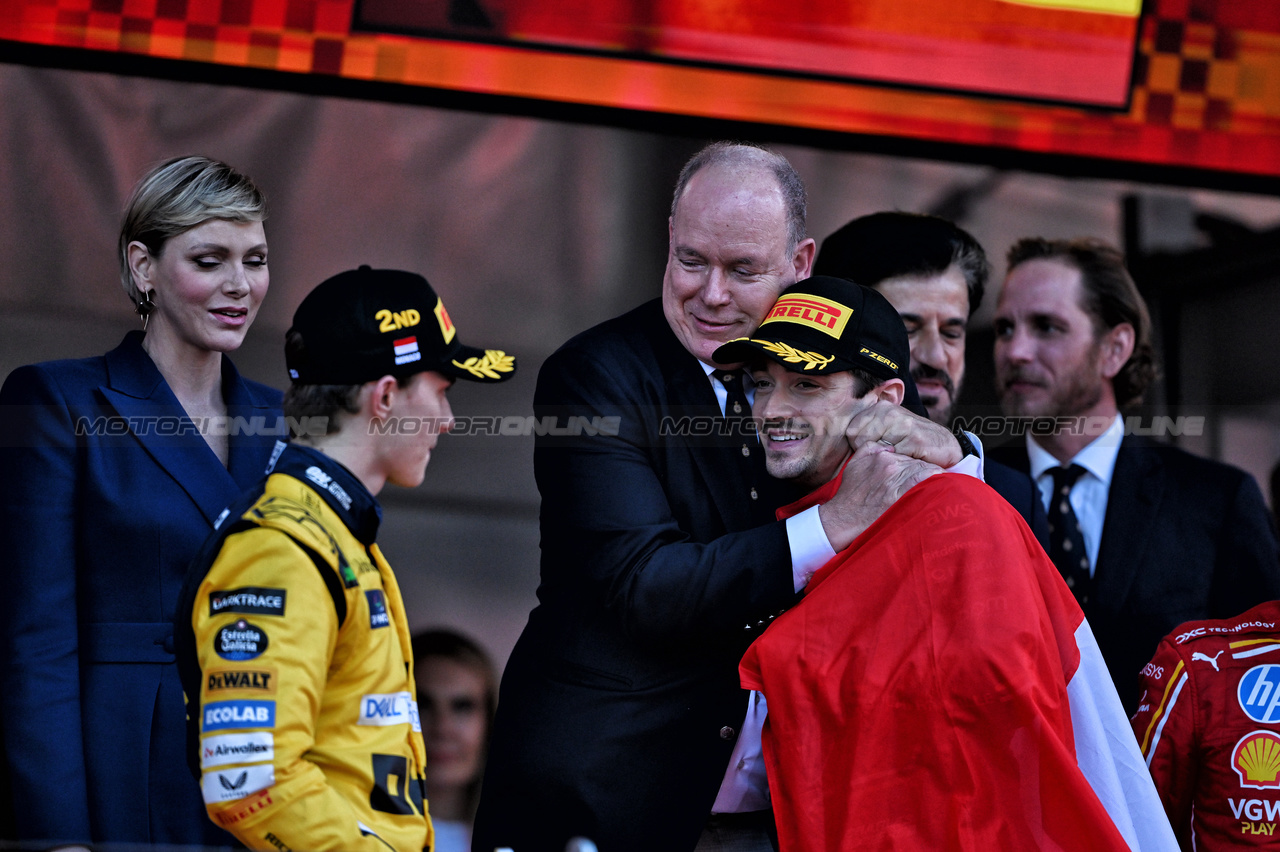 GP MONACO, Gara winner Charles Leclerc (MON) Ferrari celebrates on the podium with HSH Prince Albert of Monaco (MON).

26.05.2024. Formula 1 World Championship, Rd 8, Monaco Grand Prix, Monte Carlo, Monaco, Gara Day.

- www.xpbimages.com, EMail: requests@xpbimages.com © Copyright: Price / XPB Images