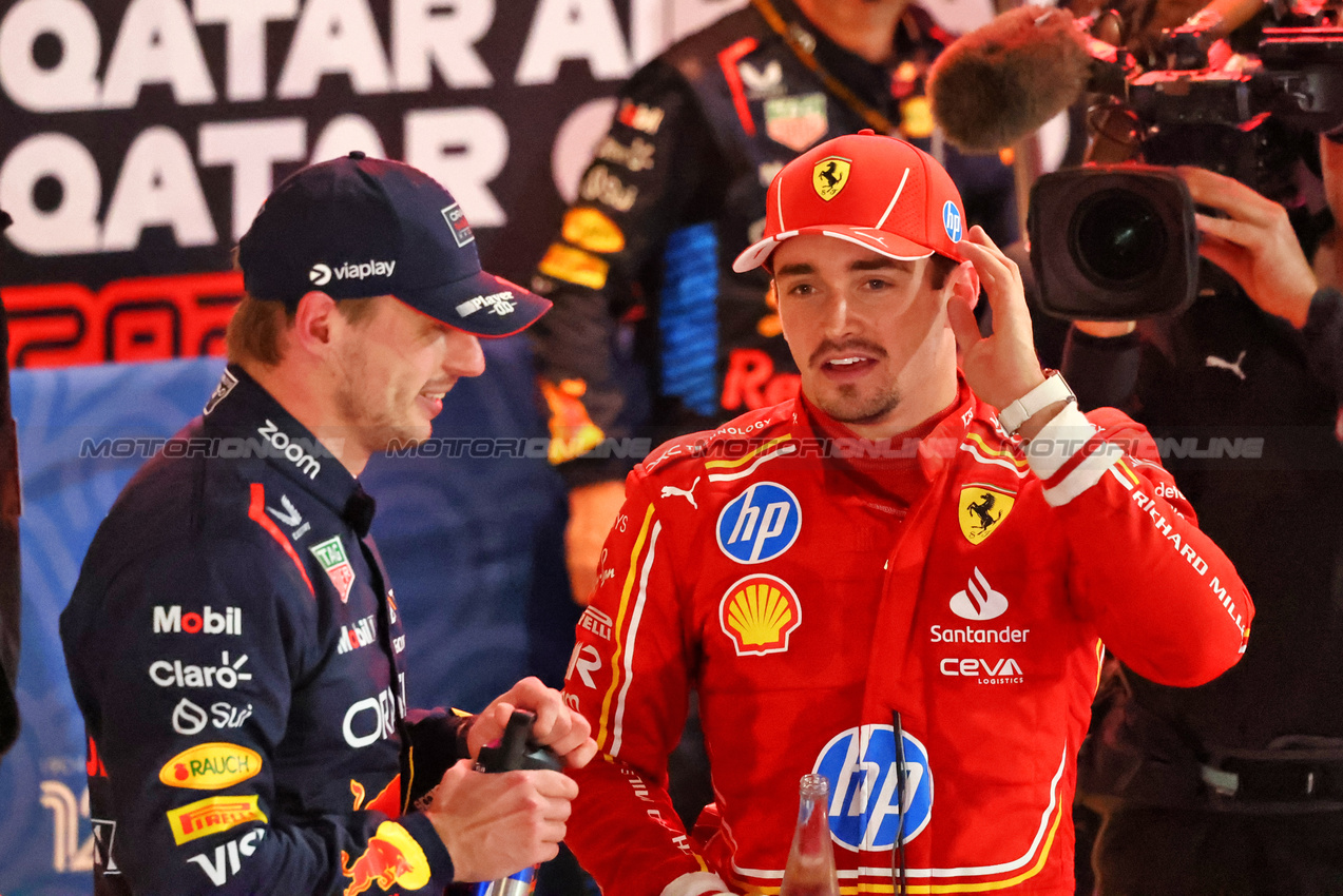 GP QATAR, (L to R): Gara winner Max Verstappen (NLD) Red Bull Racing with second placed Charles Leclerc (MON) Ferrari in parc ferme.

01.12.2024. Formula 1 World Championship, Rd 23, Qatar Grand Prix, Doha, Qatar, Gara Day.

- www.xpbimages.com, EMail: requests@xpbimages.com © Copyright: Charniaux / XPB Images