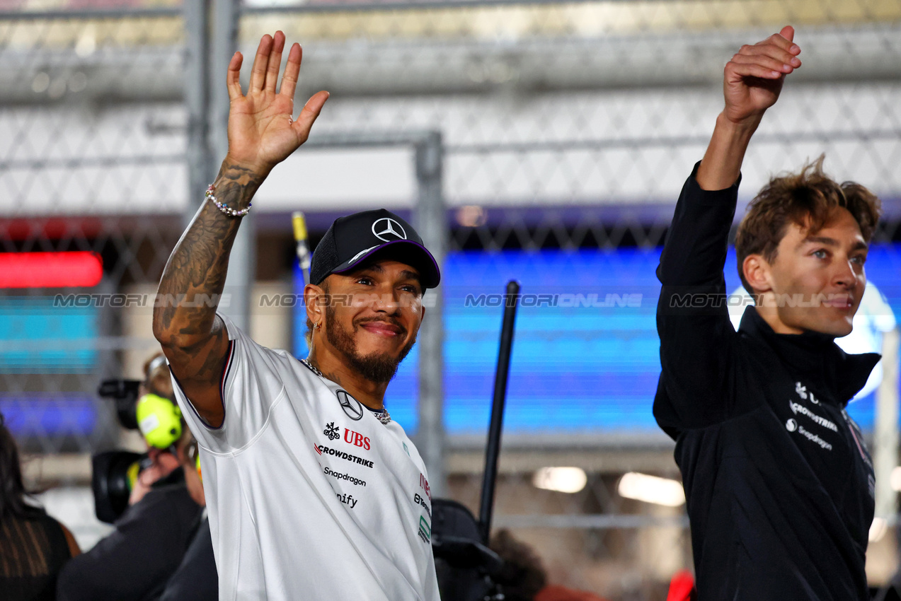 GP QATAR, Lewis Hamilton (GBR) Mercedes AMG F1 e George Russell (GBR) Mercedes AMG F1 on the drivers' parade.

01.12.2024. Formula 1 World Championship, Rd 23, Qatar Grand Prix, Doha, Qatar, Gara Day.

- www.xpbimages.com, EMail: requests@xpbimages.com © Copyright: Charniaux / XPB Images