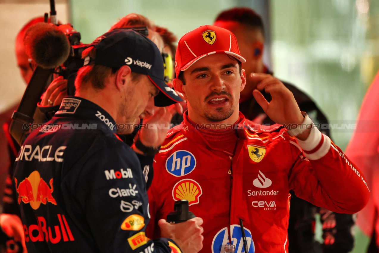 GP QATAR, (L to R): Gara winner Max Verstappen (NLD) Red Bull Racing in parc ferme with second placed Charles Leclerc (MON) Ferrari.

01.12.2024. Formula 1 World Championship, Rd 23, Qatar Grand Prix, Doha, Qatar, Gara Day.

 - www.xpbimages.com, EMail: requests@xpbimages.com © Copyright: Coates / XPB Images