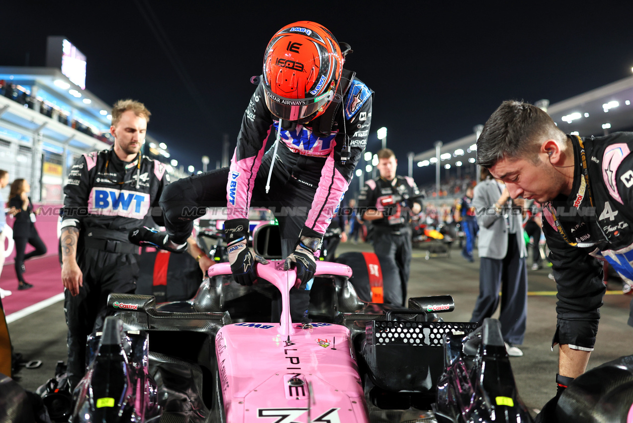 GP QATAR, Esteban Ocon (FRA) Alpine F1 Team A524 on the grid.

01.12.2024. Formula 1 World Championship, Rd 23, Qatar Grand Prix, Doha, Qatar, Gara Day.

 - www.xpbimages.com, EMail: requests@xpbimages.com © Copyright: Staley / XPB Images