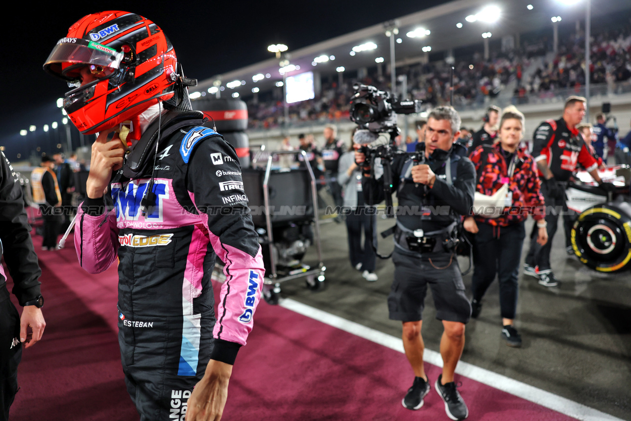GP QATAR, Esteban Ocon (FRA) Alpine F1 Team on the grid.

01.12.2024. Formula 1 World Championship, Rd 23, Qatar Grand Prix, Doha, Qatar, Gara Day.

 - www.xpbimages.com, EMail: requests@xpbimages.com © Copyright: Staley / XPB Images
