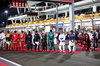 GP QATAR, Drivers as the grid observes the national anthem.

01.12.2024. Formula 1 World Championship, Rd 23, Qatar Grand Prix, Doha, Qatar, Gara Day.

 - www.xpbimages.com, EMail: requests@xpbimages.com © Copyright: Staley / XPB Images
