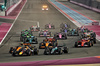 GP QATAR, George Russell (GBR) Mercedes AMG F1 W15 is passed by Max Verstappen (NLD) Red Bull Racing RB20 at the partenza of the race.

01.12.2024. Formula 1 World Championship, Rd 23, Qatar Grand Prix, Doha, Qatar, Gara Day.

- www.xpbimages.com, EMail: requests@xpbimages.com © Copyright: Charniaux / XPB Images