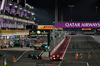 GP QATAR, Marshals remove debris from the partenza / finish straight as Max Verstappen (NLD) Red Bull Racing RB20 davanti a behind the Mercedes FIA Safety Car.

01.12.2024. Formula 1 World Championship, Rd 23, Qatar Grand Prix, Doha, Qatar, Gara Day.

 - www.xpbimages.com, EMail: requests@xpbimages.com © Copyright: Coates / XPB Images