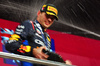 GP QATAR, Gara winner Max Verstappen (NLD) Red Bull Racing celebrates on the podium.

01.12.2024. Formula 1 World Championship, Rd 23, Qatar Grand Prix, Doha, Qatar, Gara Day.

 - www.xpbimages.com, EMail: requests@xpbimages.com © Copyright: Coates / XPB Images