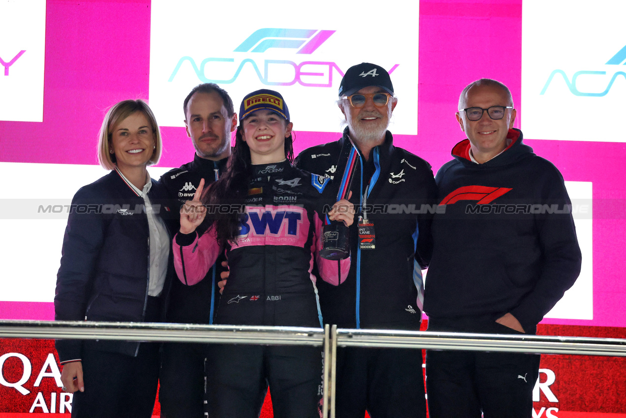 GP QATAR, The podium (L to R): Susie Wolff (GBR) F1 Academy Managing Director; Oliver Oakes (GBR) Alpine F1 Team Team Principal; Abbi Pulling (GBR) Rodin Motorsport, series champions; Flavio Briatore (ITA) Alpine F1 Team Executive Advisor; e Stefano Domenicali (ITA) Formula One President e CEO.

30.11.2024. FIA Formula Academy, Rd 6, Gara 1, Losail International Circuit, Doha, Qatar, Saturday.

- www.xpbimages.com, EMail: requests@xpbimages.com Copyright: XPB Images