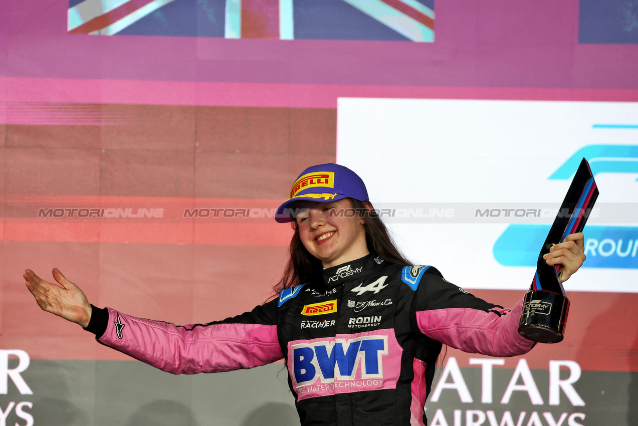 GP QATAR, Abbi Pulling (GBR) Rodin Motorsport celebrates her second position e series championship on the podium.

30.11.2024. FIA Formula Academy, Rd 6, Gara 1, Losail International Circuit, Doha, Qatar, Saturday.

- www.xpbimages.com, EMail: requests@xpbimages.com Copyright: XPB Images