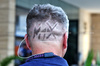 GP QATAR, Paddock Atmosfera - Max Verstappen (NLD) Red Bull Racing inspired haircut.

29.11.2024 Formula 1 World Championship, Rd 23, Qatar Grand Prix, Doha, Qatar, Sprint Qualifiche Day.

- www.xpbimages.com, EMail: requests@xpbimages.com © Copyright: Moy / XPB Images