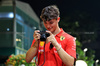 GP SINGAPORE, Oliver Bearman (GBR) Ferrari Reserve Driver takes pictures with a Leica lensed camera.

19.09.2024. Formula 1 World Championship, Rd 18, Singapore Grand Prix, Marina Bay Street Circuit, Singapore, Preparation Day.

- www.xpbimages.com, EMail: requests@xpbimages.com © Copyright: Rew / XPB Images
