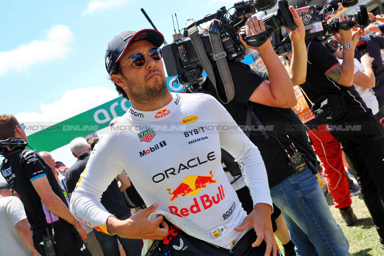 GP SPAGNA, Sergio Perez (MEX) Red Bull Racing on the grid.

23.06.2024. Formula 1 World Championship, Rd 10, Spanish Grand Prix, Barcelona, Spain, Gara Day.

- www.xpbimages.com, EMail: requests@xpbimages.com © Copyright: Batchelor / XPB Images