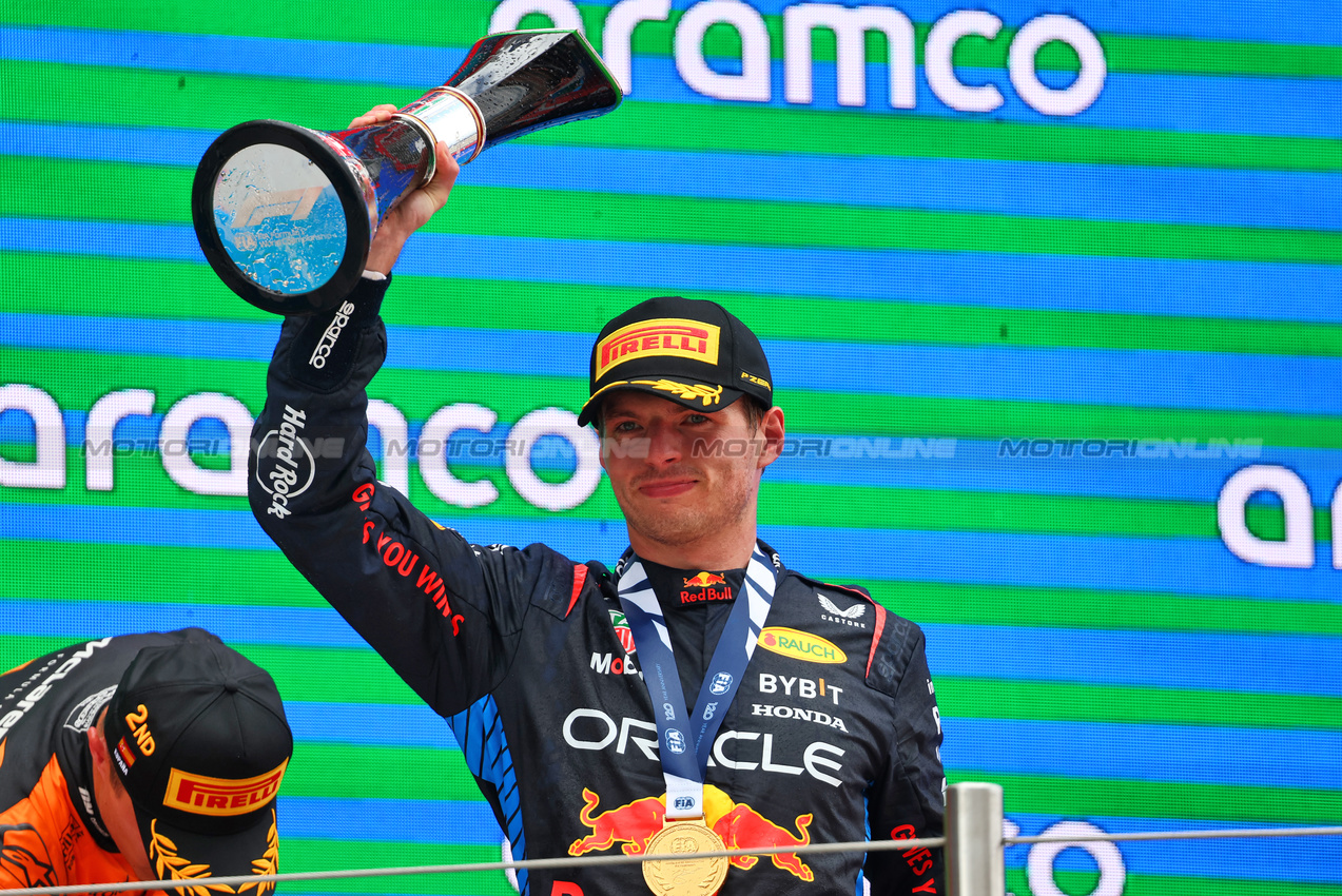 GP SPAGNA, Gara winner Max Verstappen (NLD) Red Bull Racing celebrates on the podium.

23.06.2024. Formula 1 World Championship, Rd 10, Spanish Grand Prix, Barcelona, Spain, Gara Day.

- www.xpbimages.com, EMail: requests@xpbimages.com © Copyright: Batchelor / XPB Images