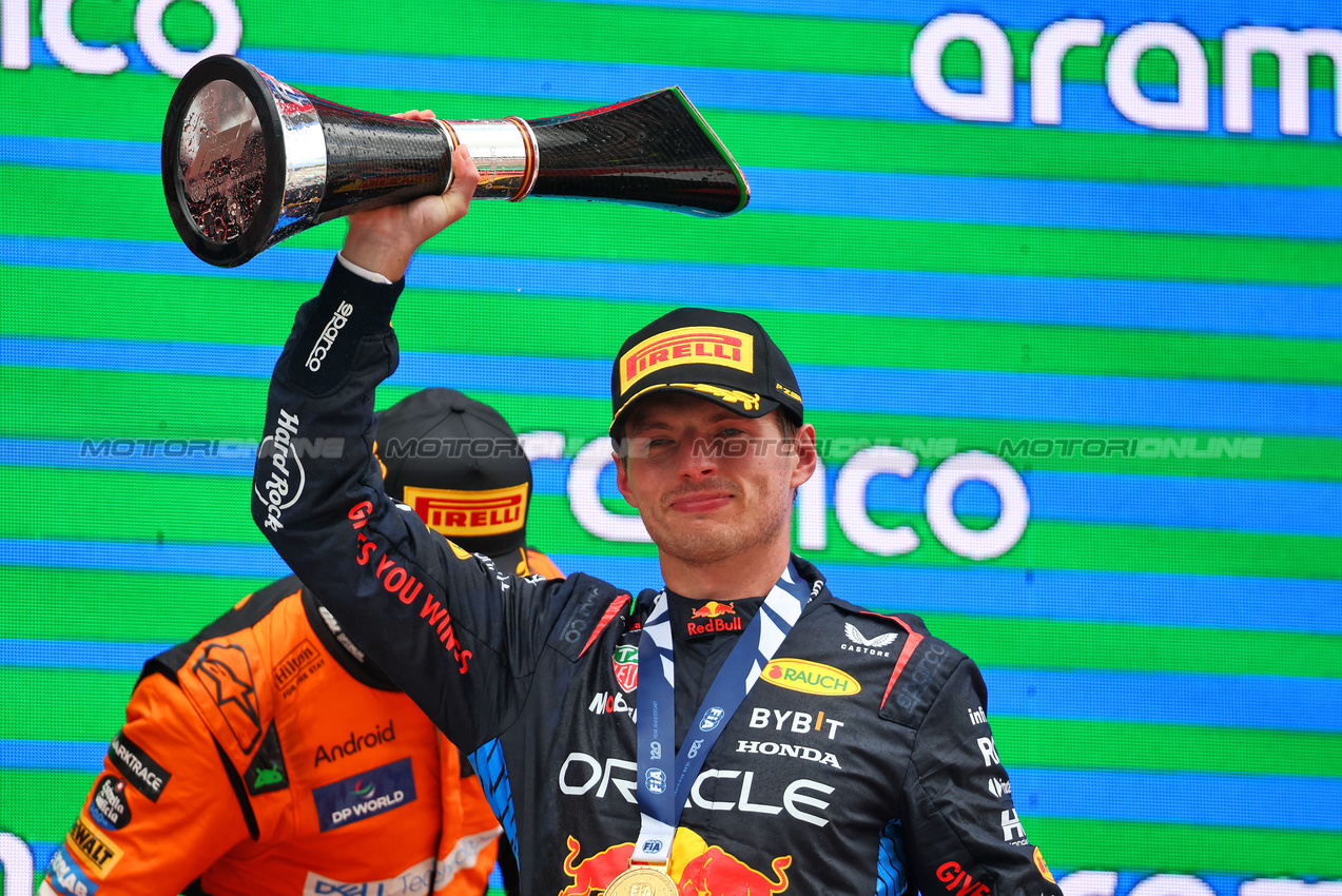 GP SPAGNA, Gara winner Max Verstappen (NLD) Red Bull Racing celebrates on the podium.

23.06.2024. Formula 1 World Championship, Rd 10, Spanish Grand Prix, Barcelona, Spain, Gara Day.

- www.xpbimages.com, EMail: requests@xpbimages.com © Copyright: Batchelor / XPB Images