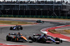 GP STATI UNITI, Oscar Piastri (AUS) McLaren MCL38 e Yuki Tsunoda (JPN) RB VCARB 01 battle for position.

19.10.2024. Formula 1 World Championship, Rd 19, United States Grand Prix, Austin, Texas, USA, Sprint e Qualifiche Day.

 - www.xpbimages.com, EMail: requests@xpbimages.com © Copyright: Coates / XPB Images