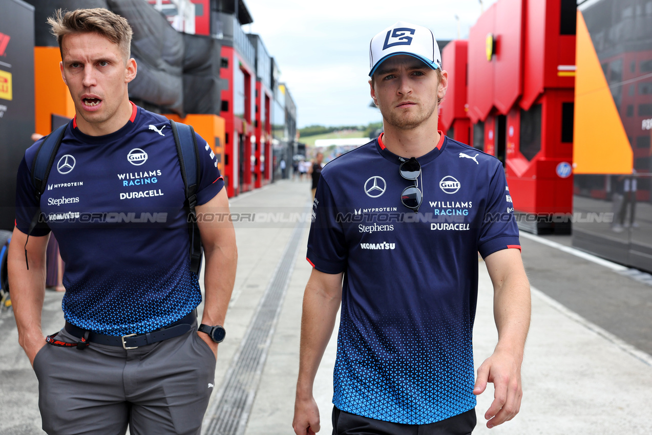 GP UNGHERIA, (L to R): Elias Huhtinen (FIN) Williams Racing Personal Trainer with Logan Sargeant (USA) Williams Racing.

20.07.2024. Formula 1 World Championship, Rd 13, Hungarian Grand Prix, Budapest, Hungary, Qualifiche Day.

- www.xpbimages.com, EMail: requests@xpbimages.com © Copyright: Bearne / XPB Images