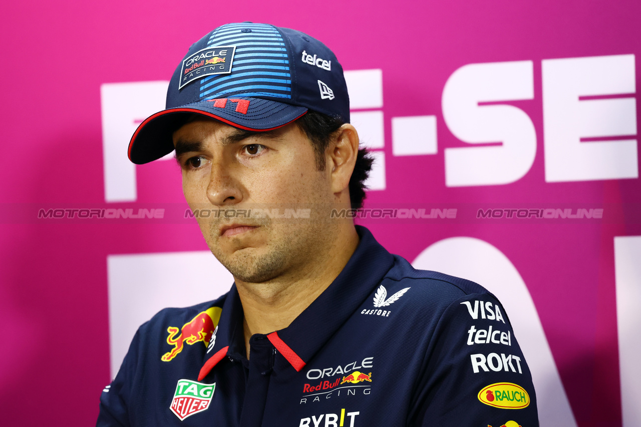 TEST BAHRAIN, Sergio Perez (MEX) Red Bull Racing in the FIA Press Conference.

21.02.2024. Formula 1 Testing, Sakhir, Bahrain, Day One.

- www.xpbimages.com, EMail: requests@xpbimages.com © Copyright: Charniaux / XPB Images