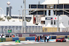 TEST BAHRAIN, Circuit workers inspect the circuit for a damaged drain cover at turn 11.
22.02.2024. Formula 1 Testing, Sakhir, Bahrain, Day Two.
- www.xpbimages.com, EMail: requests@xpbimages.com © Copyright: Bearne / XPB Images