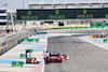 TEST BAHRAIN, Circuit workers inspect the circuit for a damaged drain cover at turn 11.
22.02.2024. Formula 1 Testing, Sakhir, Bahrain, Day Two.
- www.xpbimages.com, EMail: requests@xpbimages.com © Copyright: Bearne / XPB Images