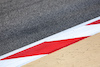 TEST BAHRAIN, A kerb drain cover at turn 11.
22.02.2024. Formula 1 Testing, Sakhir, Bahrain, Day Two.
- www.xpbimages.com, EMail: requests@xpbimages.com © Copyright: Bearne / XPB Images