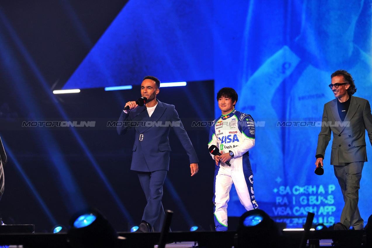 F1 75 LIVE, (L to R): Munya Chawawa (GBR) Actor with Yuki Tsunoda (JPN) Racing Bulls e Lawrence Barretto (GBR) Formula 1 Senior Writer Editor.

18.02.2025. Formula One World Championship, F1 75 Live. O2 Arena, London, England.

- www.xpbimages.com, EMail: requests@xpbimages.com © Copyright: Batchelor / XPB Images